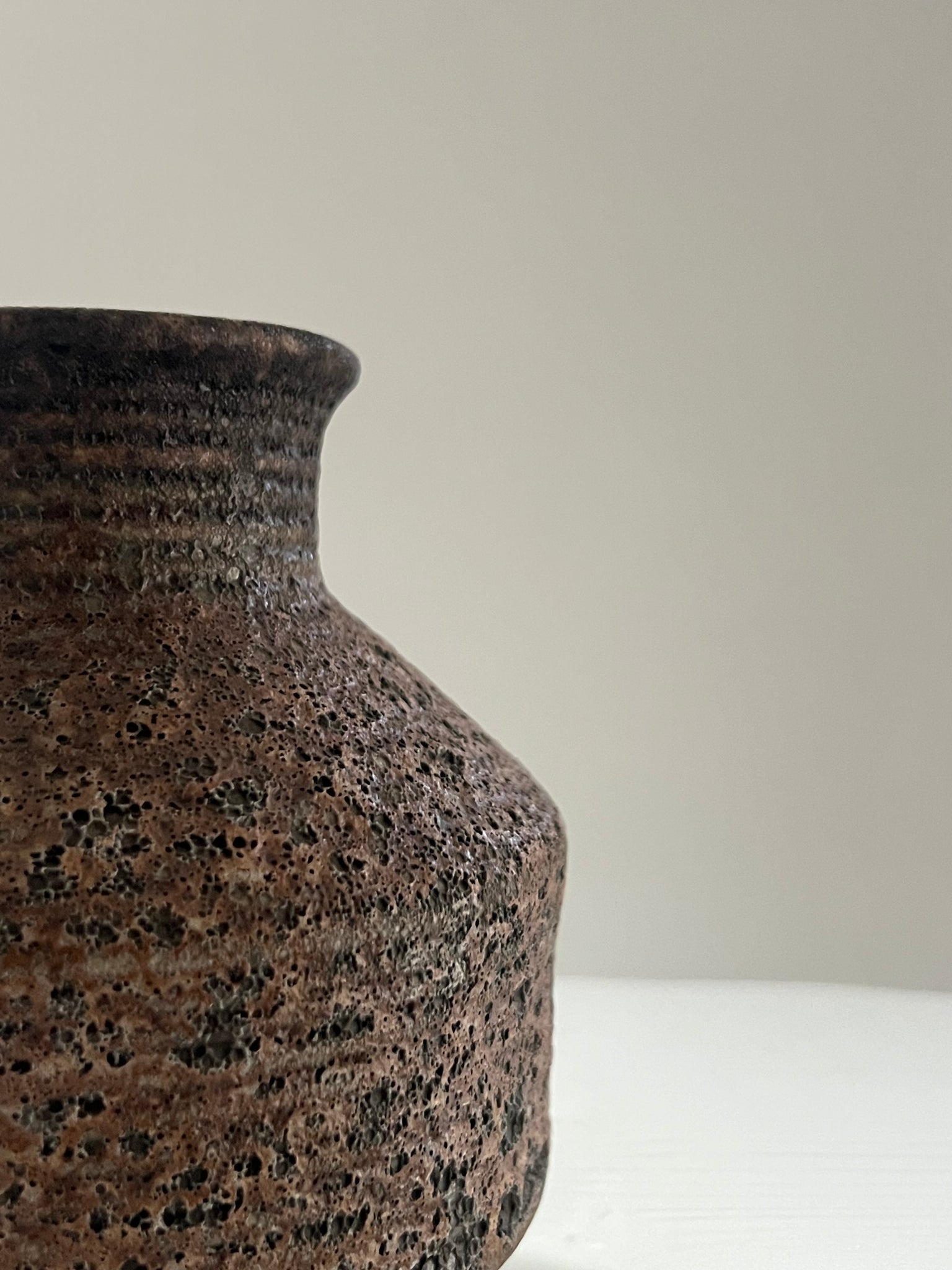 Small textured brown vintage vase