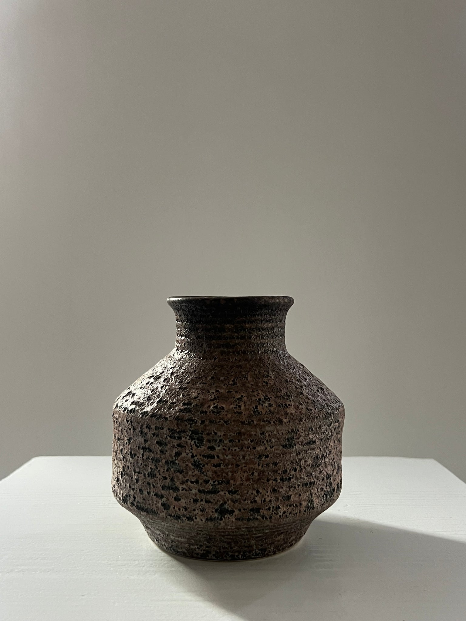Small textured brown vintage vase