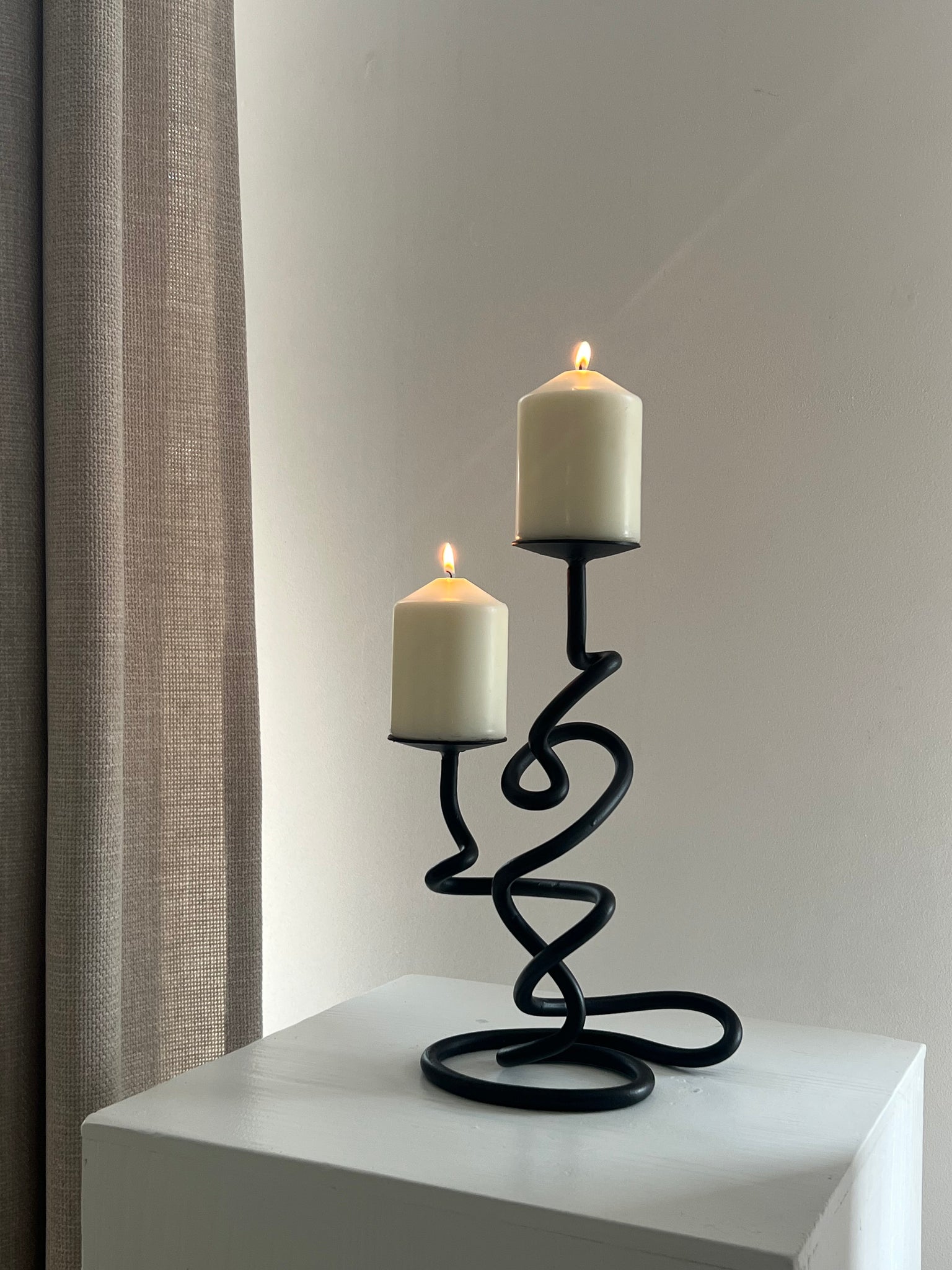 Brutalist style metal candle holder
