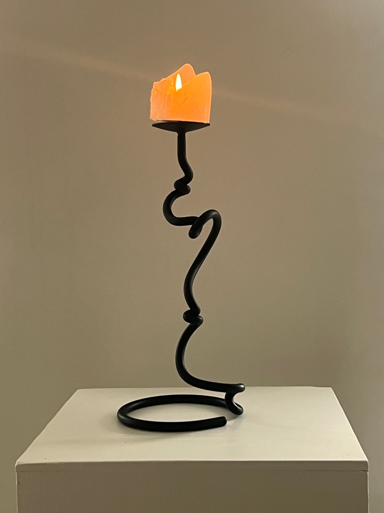 Brutalist style metal candle holder
