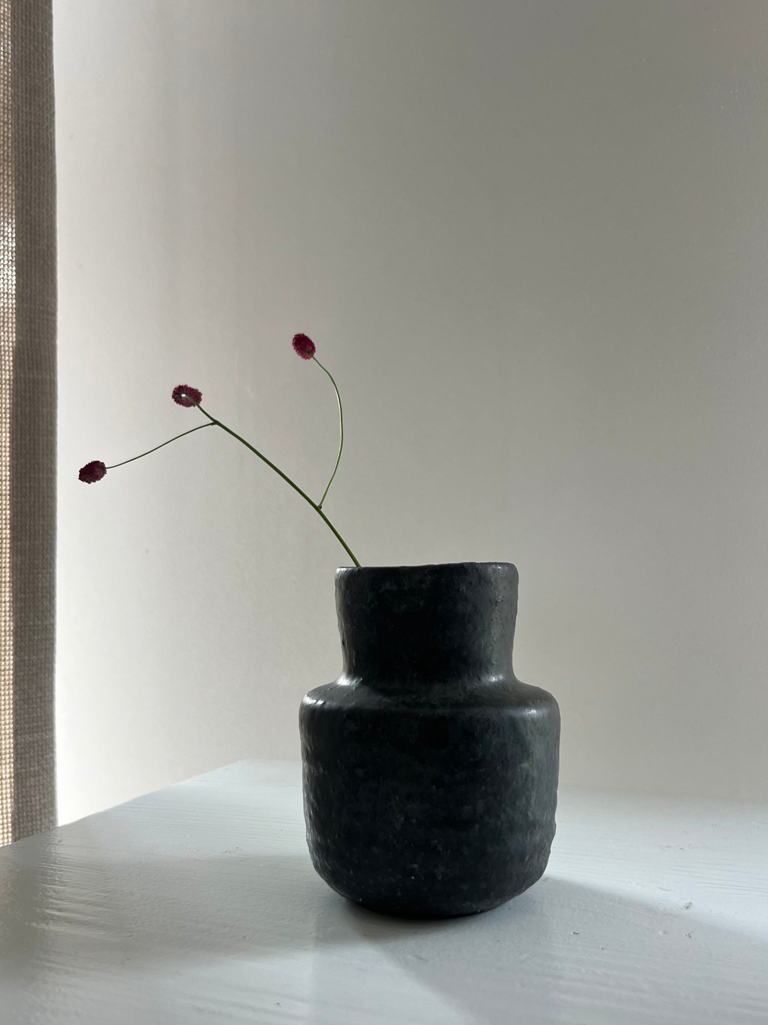 Vintage black ceramic vase