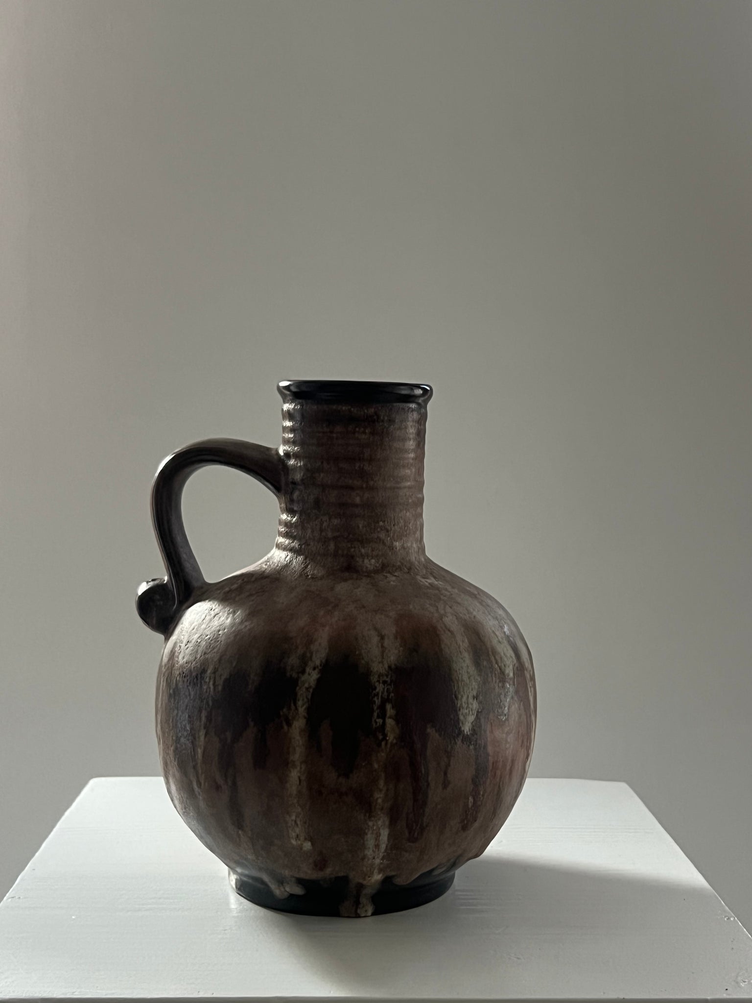 Vintage ceramic vase with handle