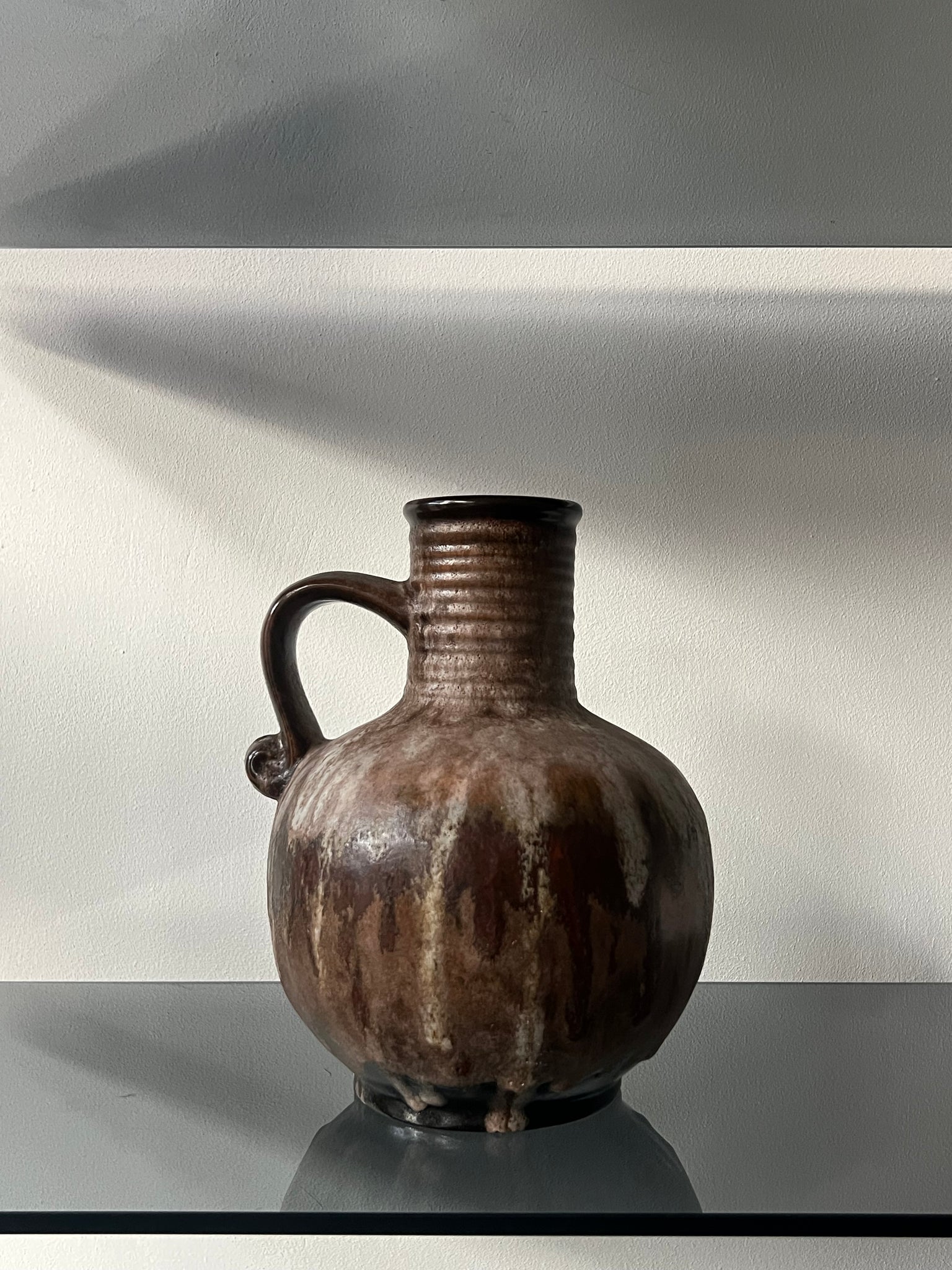 Vintage ceramic vase with handle