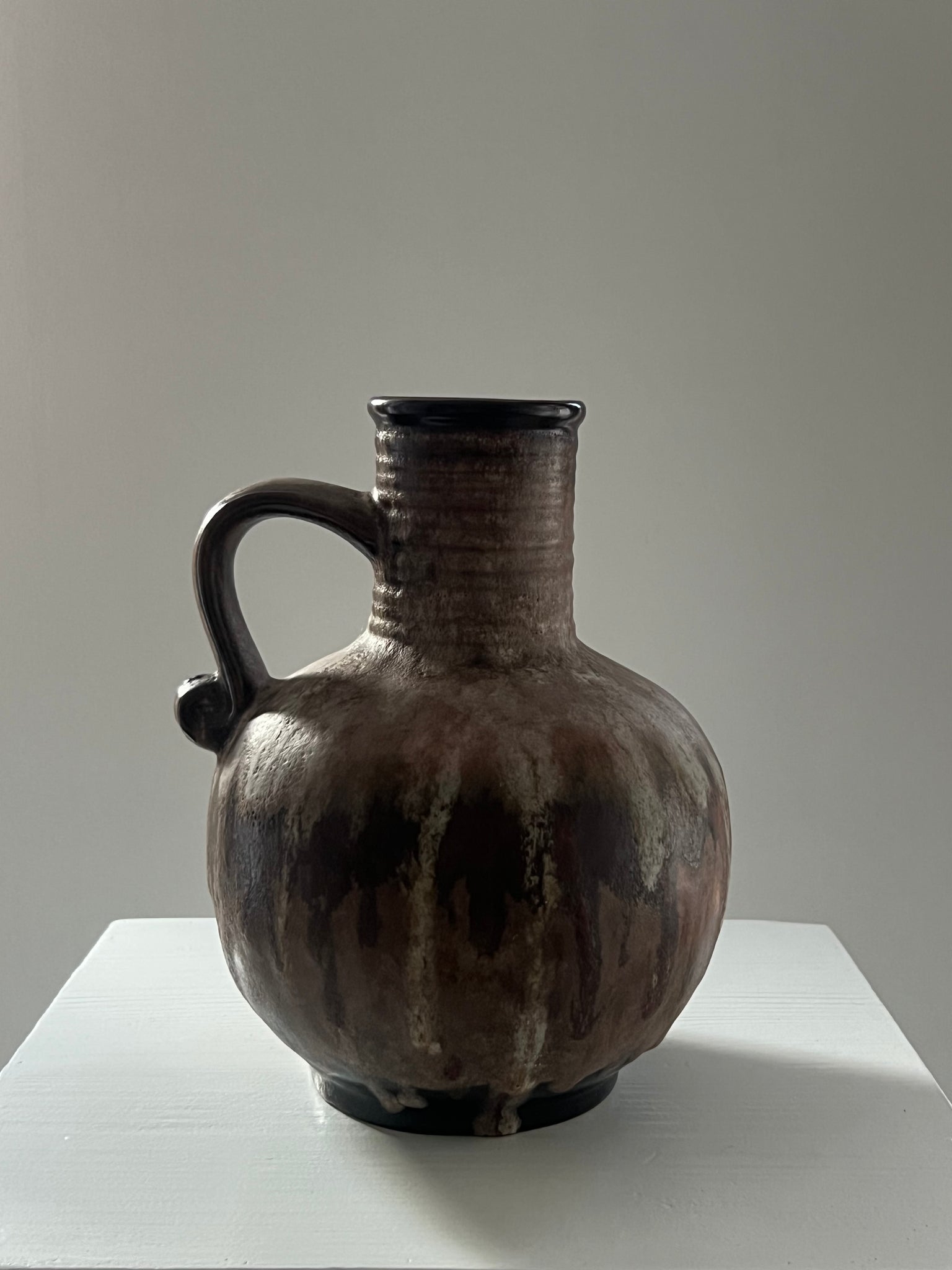 Vintage ceramic vase with handle