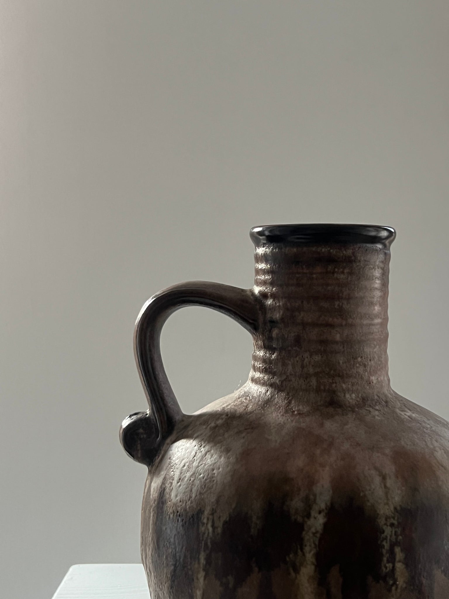 Vintage ceramic vase with handle