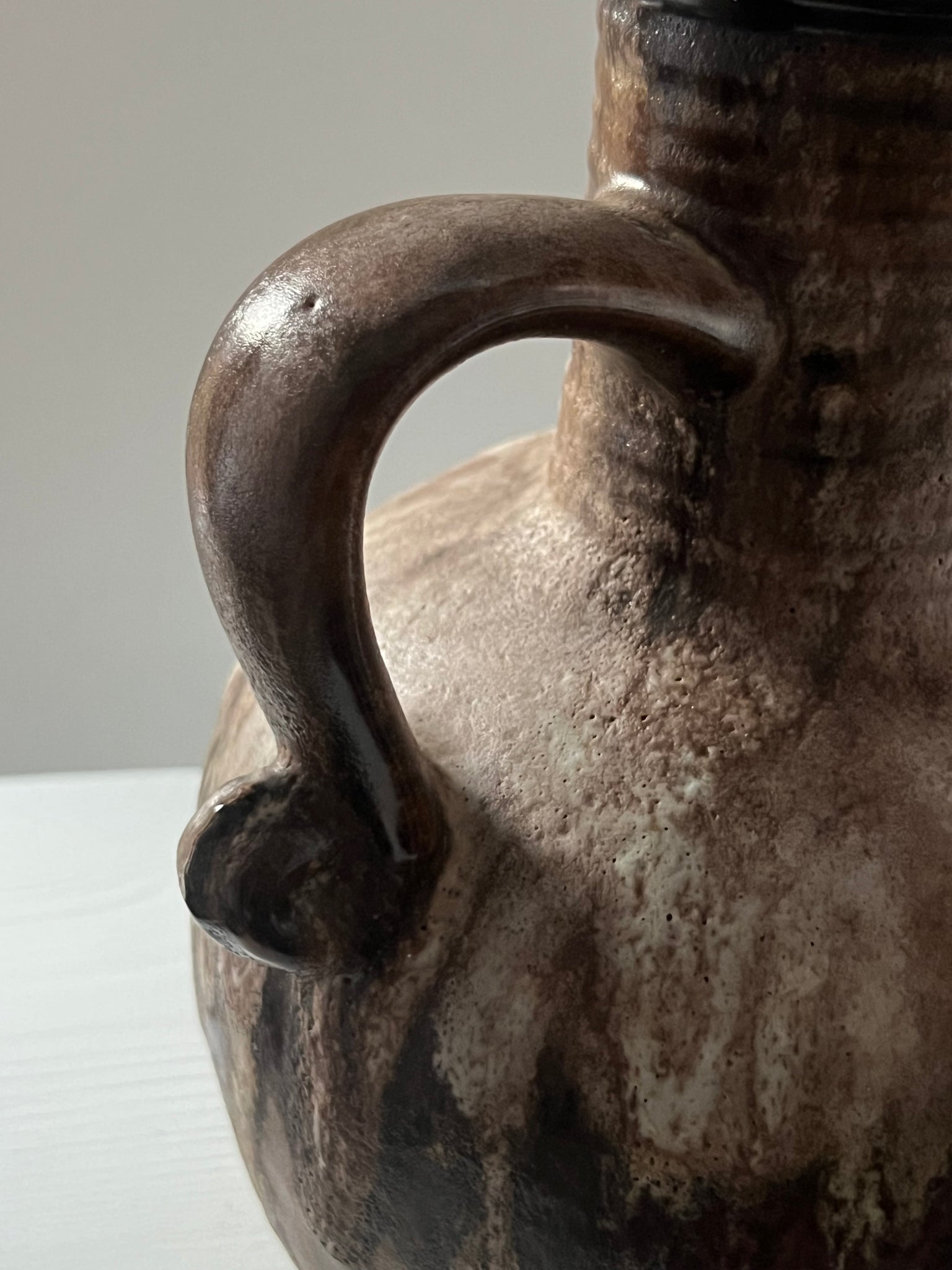 Vintage ceramic vase with handle