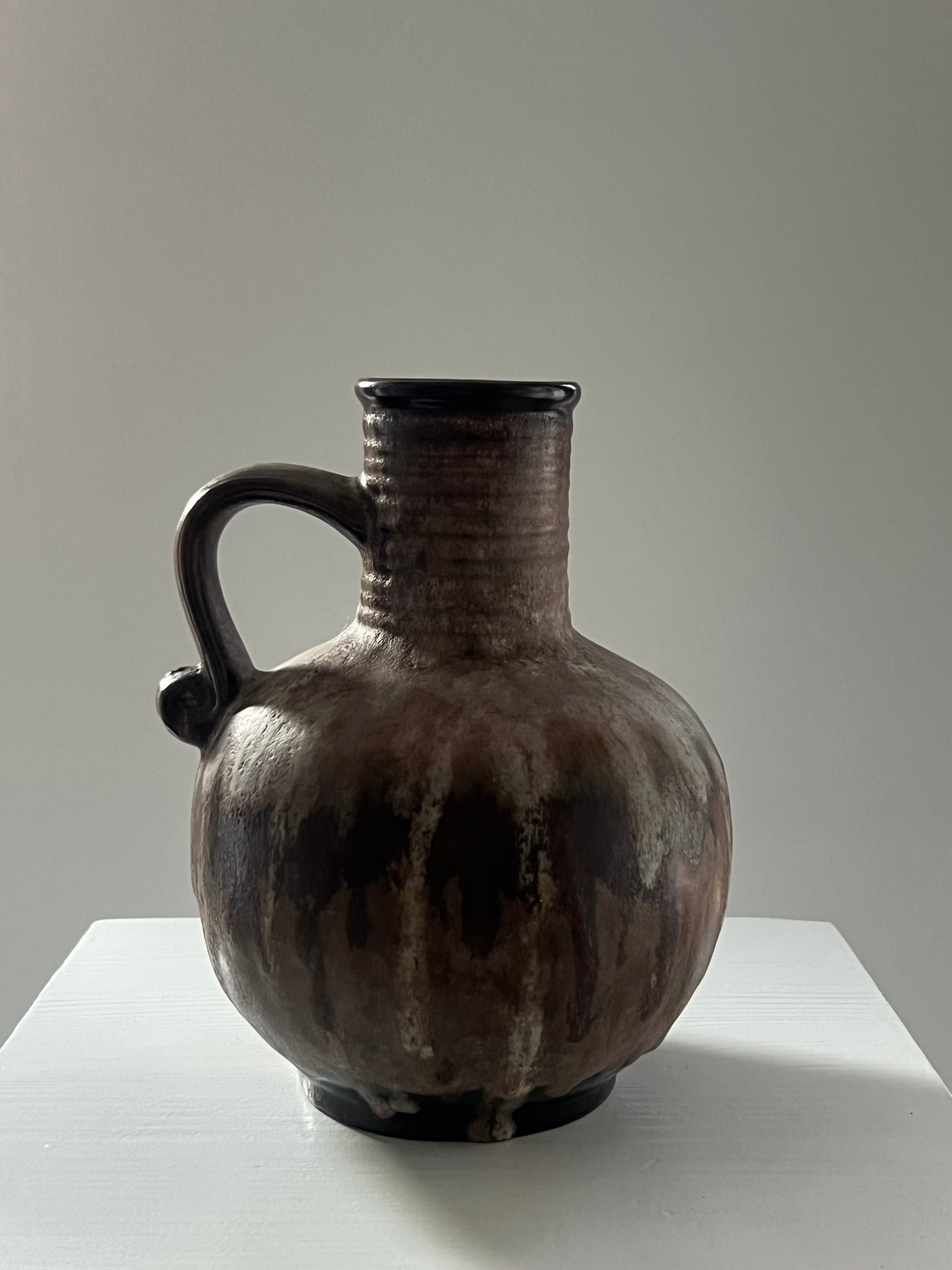 Vintage ceramic vase with handle