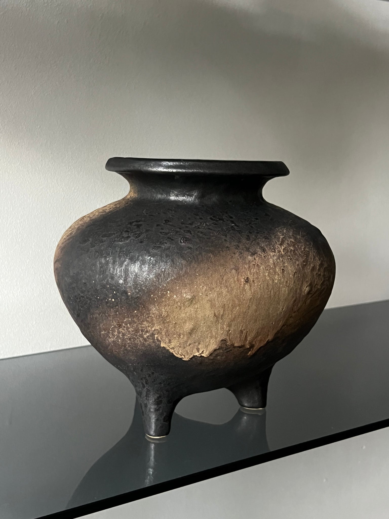 Vintage three-legged ceramic vase